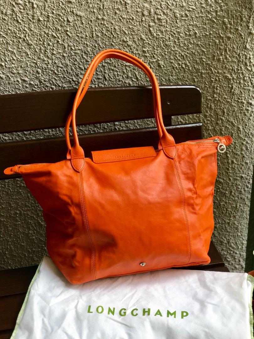 Authentic Longchamp Leather Zip Around Wallet Orange – Relics to