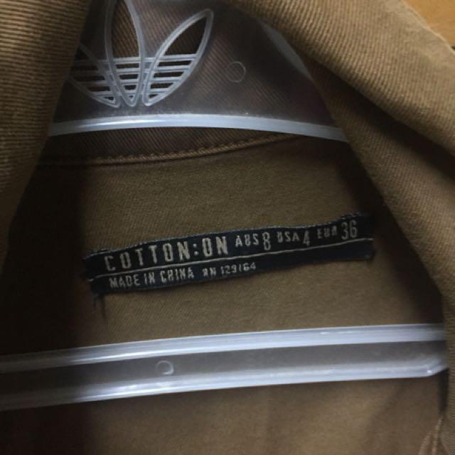 Brown Parka Cotton On (Category: Coats, Jackets and Outerwear) located in Taguig. Submitted by prfrialde (Listing ID 144866670, Image 2). Description: Missing one botton (top most) not really used.