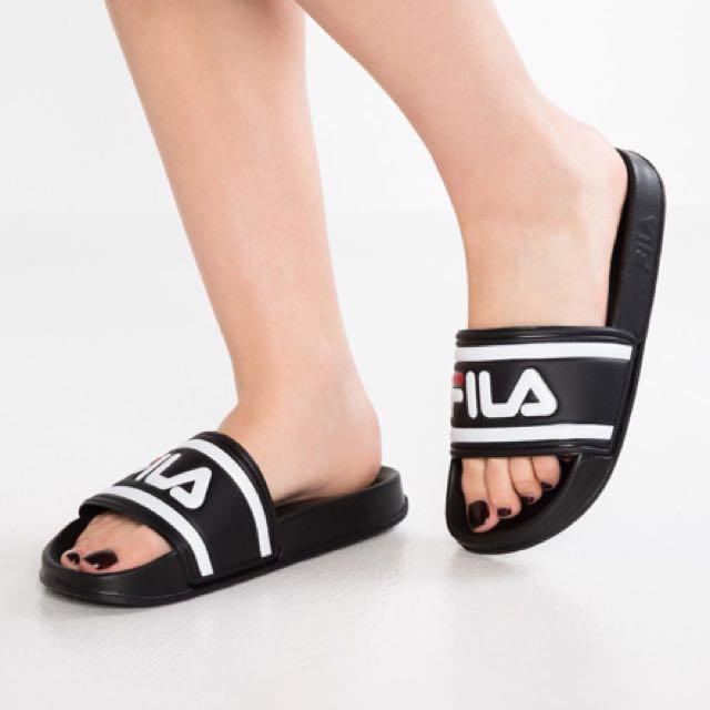 fila sandals on feet