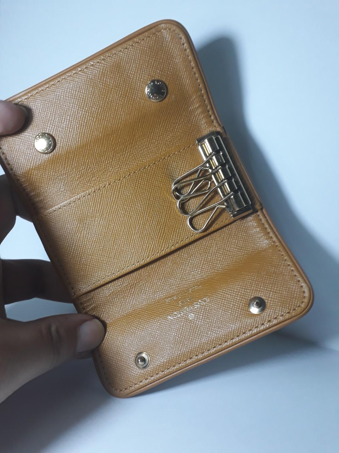 Authentic LOUIS VUITTON 4 Ring Key Holder (Mini Lin) (Category: Luxury Accessories) located in Quezon City. Submitted by vintagevuitton (Listing ID 191604473, Image 2). Description: USED and in EXCELLENT CONDITION! Inclusions: None Can be HOT-STAMPED at LV Solaire or Greenbelt! You are PURCHASING a Pre-Loved item as described, ASK questions before buying. NO RETURN, NO EXCHANGE!.