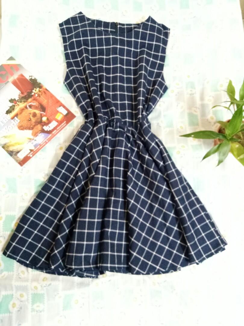 Blue plaid dress (Category: Dresses) located in Marikina City. Submitted by threefty (Listing ID 191912211, Image 1). Description: Navy blue plaid dress Fits Medium to Large Zip back + Garterized waist No Flaws Above knee.