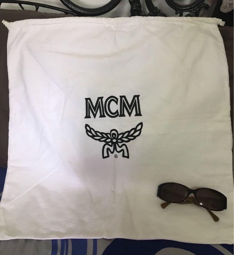 Mcm backpack hotsell dust bag