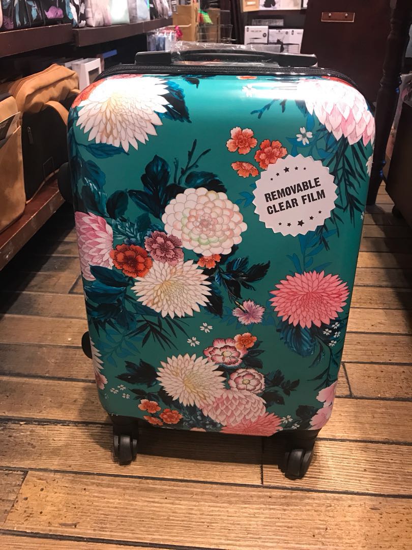 typo small suitcase