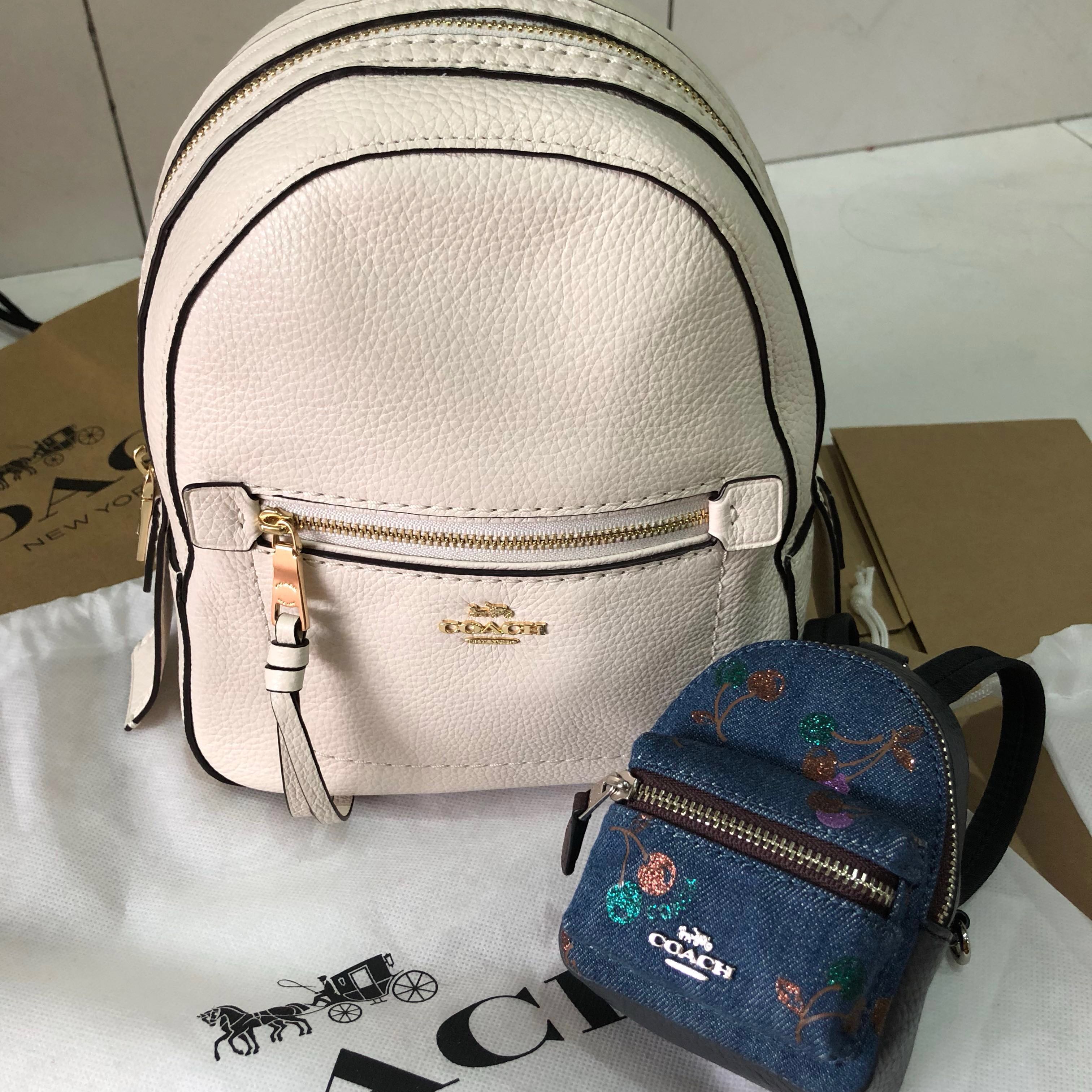 coach sling backpack women's