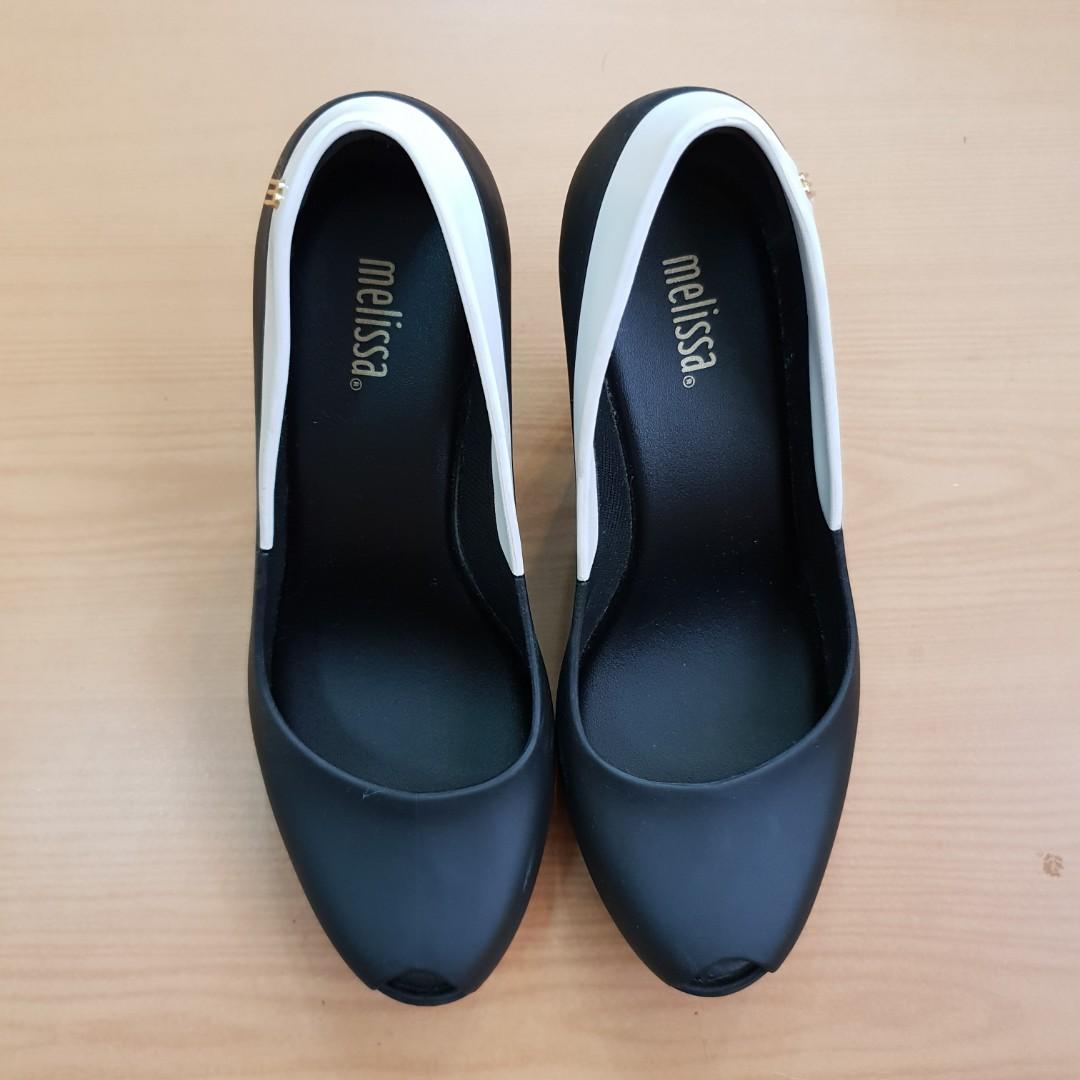 Repriced: MELISSA Queen Wedge II (Black & White) (Category: Slippers and slides) located in Bayombong. Submitted by aby28 (Listing ID 192004259, Image 1). Description: MELISSA QUEEN WEDGE II US7 in Black & White Rarely used. Slight scratches (see 3rd pic) Bought from Melissa Glorietta (at a sale price P3k+, actual price is more than P5k).