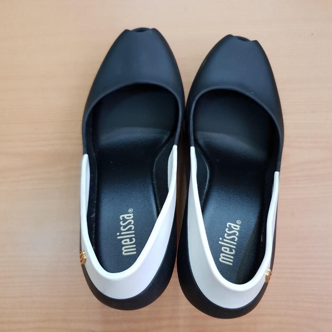 Repriced: MELISSA Queen Wedge II (Black & White) (Category: Slippers and slides) located in Bayombong. Submitted by aby28 (Listing ID 192004259, Image 2). Description: MELISSA QUEEN WEDGE II US7 in Black & White Rarely used. Slight scratches (see 3rd pic) Bought from Melissa Glorietta (at a sale price P3k+, actual price is more than P5k).