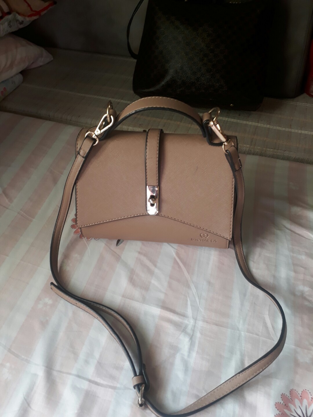Michaela sling bag 2025 price