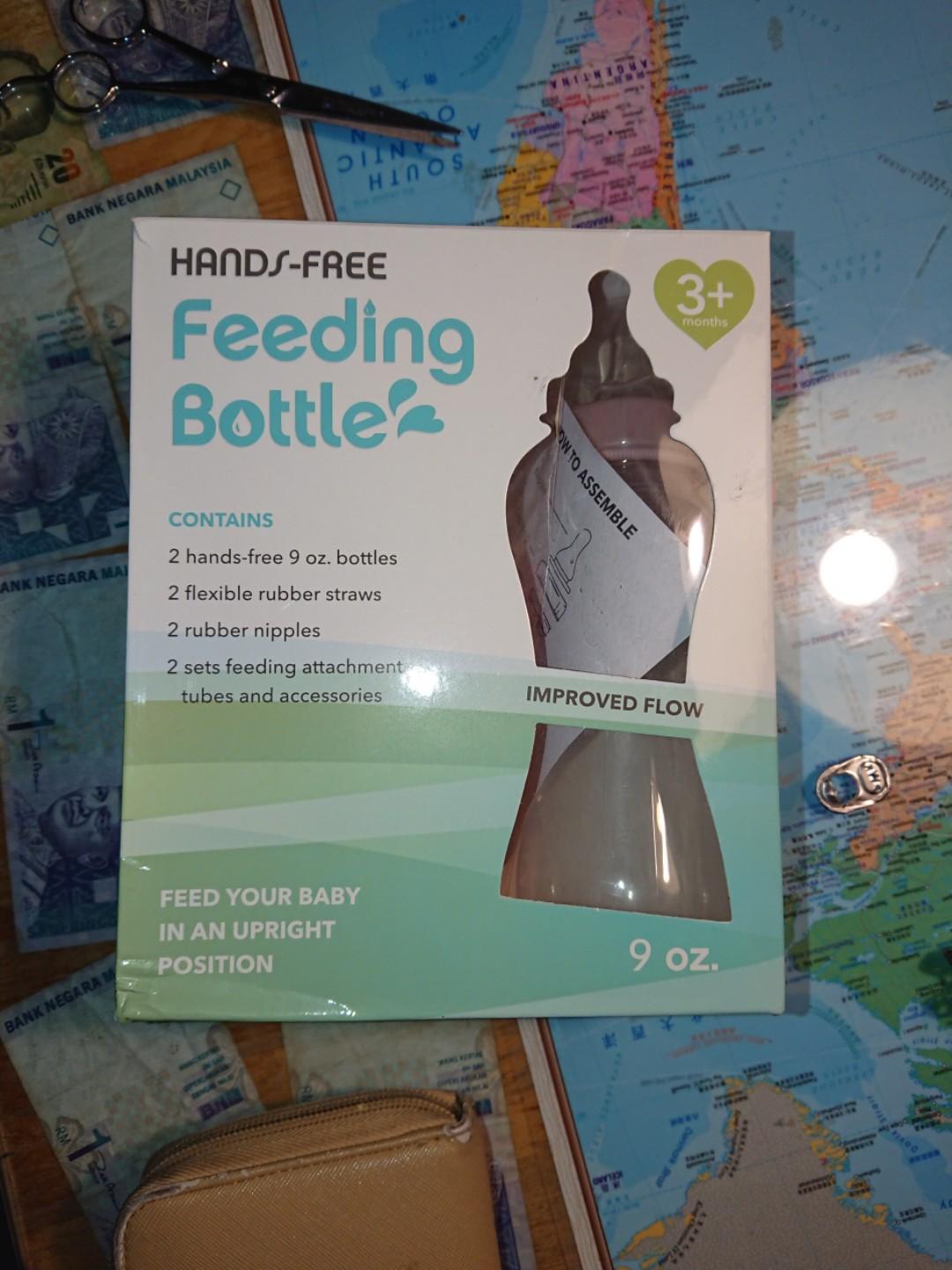Hands free feeding bottle tinukim top