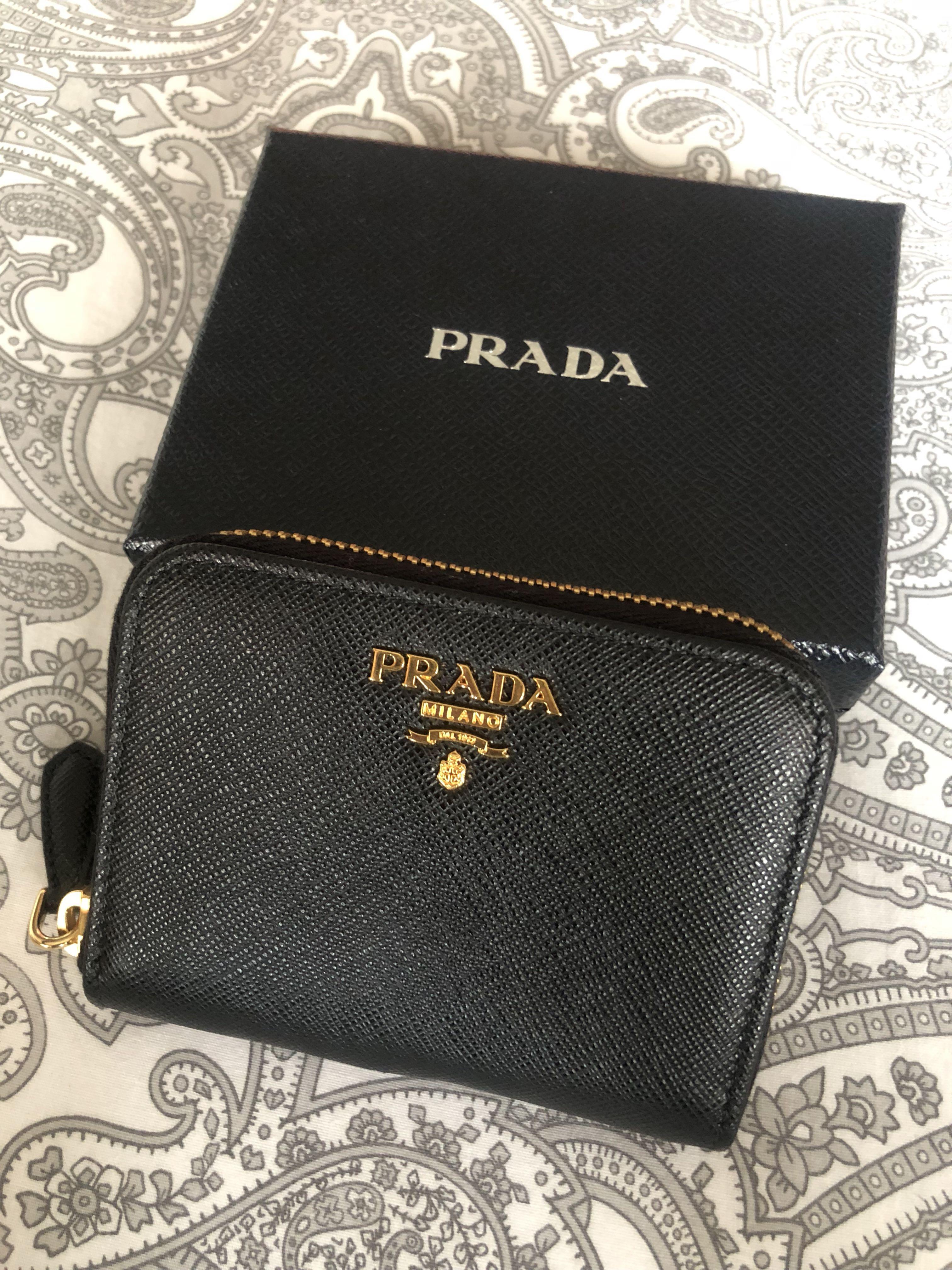 Prada metal mini zipper wallet, Luxury, Bags & Wallets on Carousell