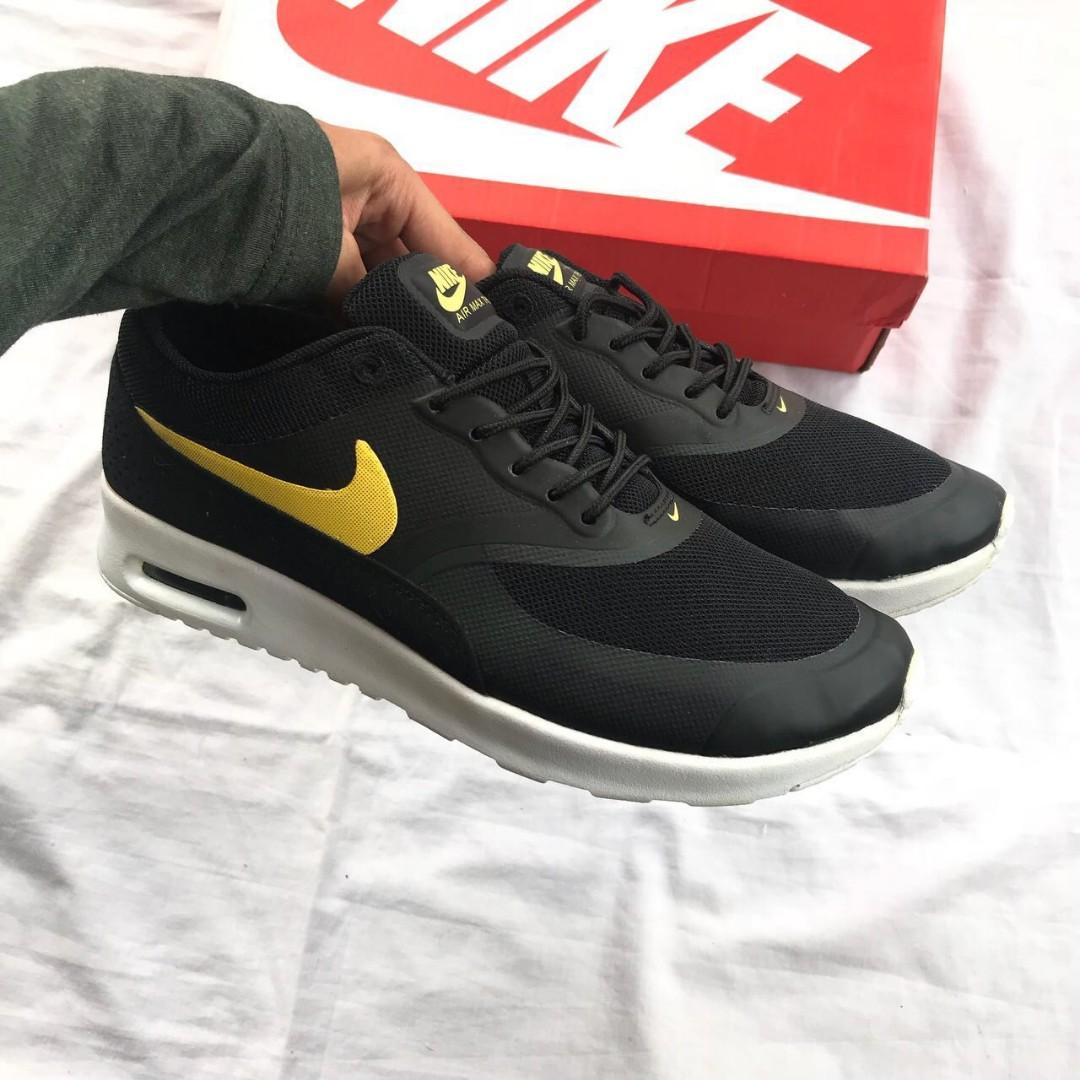 Nike air max hotsell thea black and gold