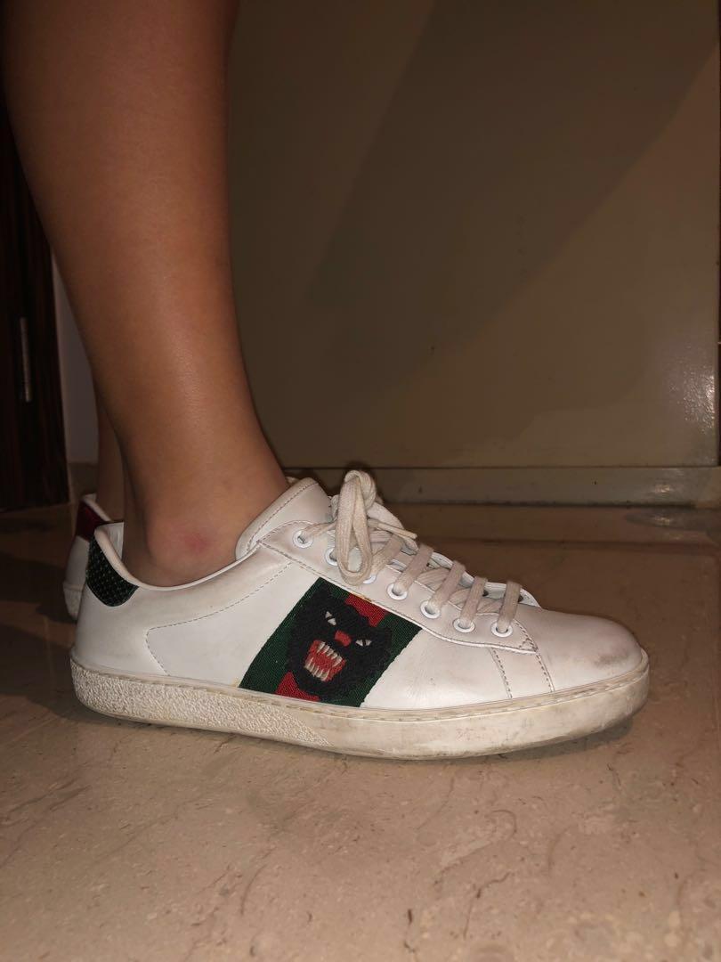 Gucci online panther sneakers