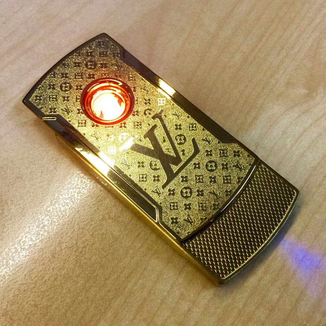 LV design rechargeable USB lighter, TV & Home Appliances, Electrical,  Adaptors & Sockets on Carousell