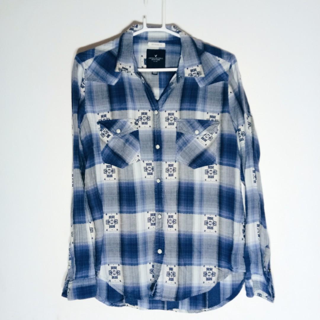 American Eagle Outfitters button down shirt (Category: Others Tops) located in Quezon City. Submitted by rainbowpride (Listing ID 192587933, Image 1). Description: American Eagle Outfitters Blue Plaid Button Down. This button down shirt is in boyfriend fit. Size small but fits medium built. 100% cotton. In good condition. Flaws: small hole at the back of the left sleeve. See last pic for reference.