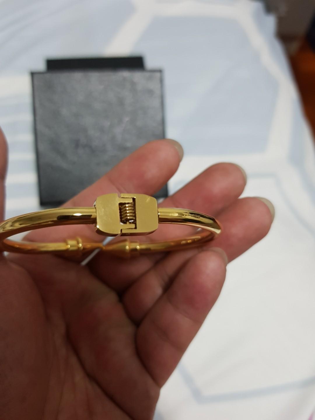 Bracelets (Category: Bracelets) located in Singapore. Submitted by aven123 (Listing ID 192536215, Image 5). Description: Selling at $20.00 PER PIECE OR $40.00 FOR BOTH 2 PIECES - got it as a gift and I believe it's 1 for men's and 1 for ladies - both with box - what u see is what u get - non refundable once item is sold.
