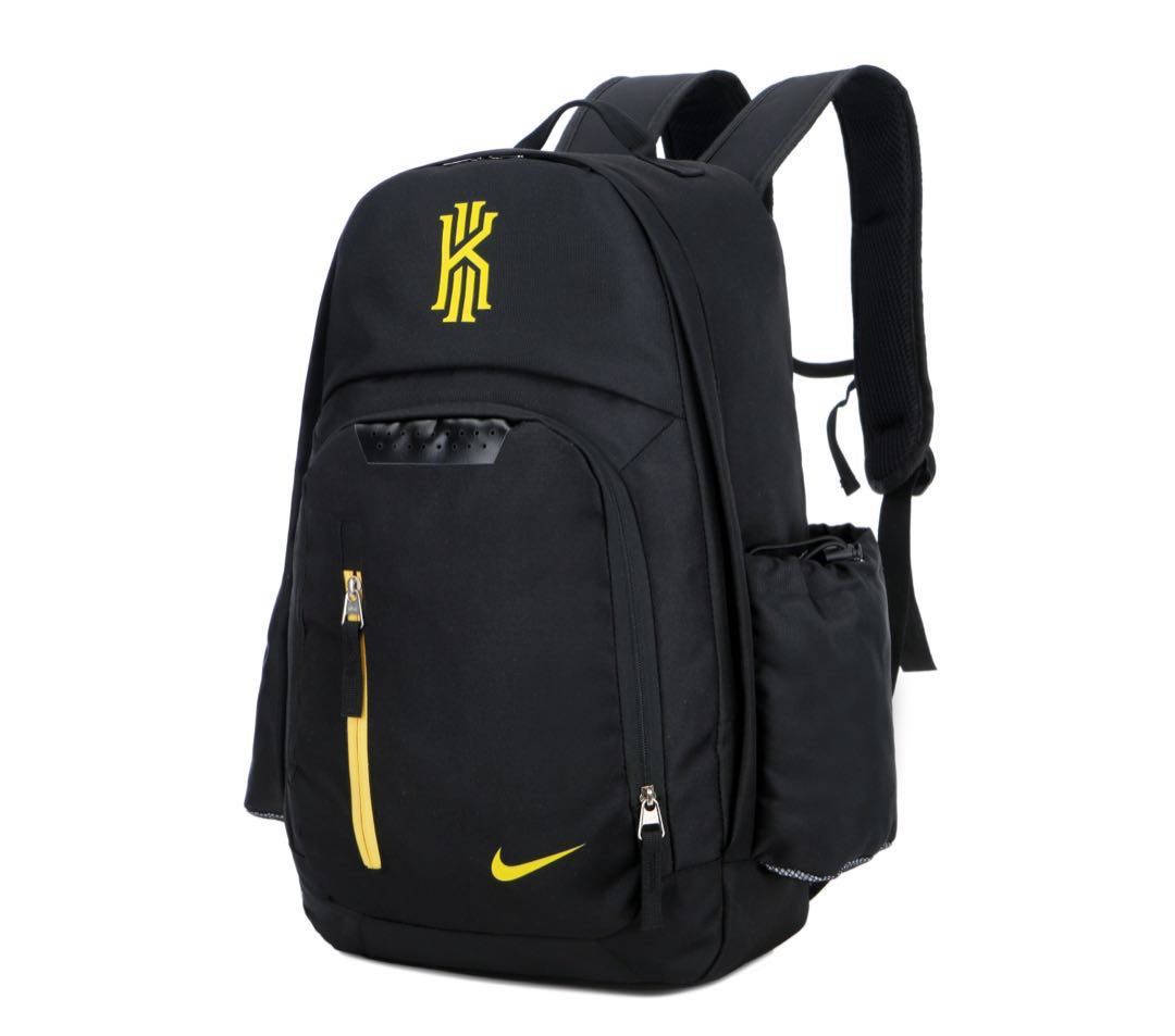 black and gold nike backpack