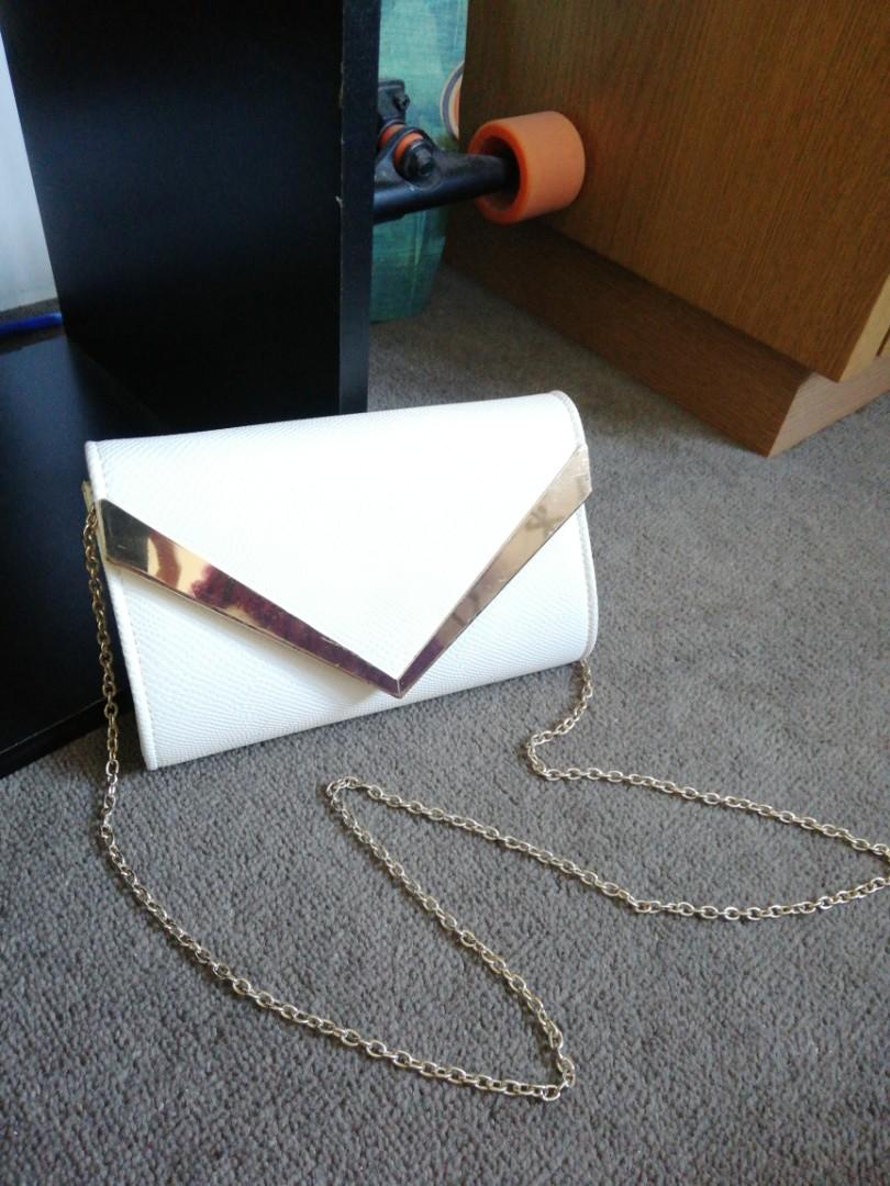 Colette White and gold clutch bag Women s Fashion Bags Wallets
