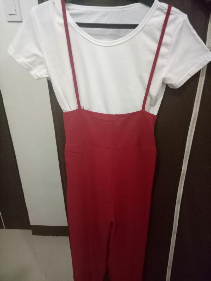 white shirt under jumpsuit