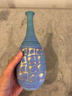 Beautiful blue and yellow handmade pottery piece