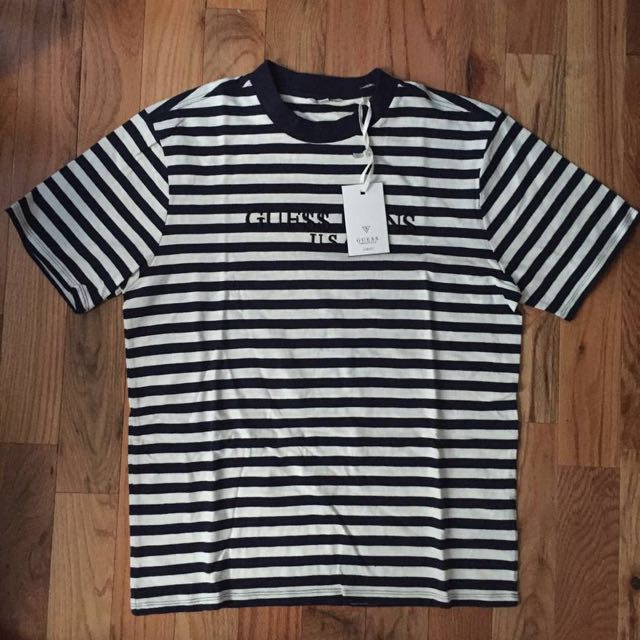 white and black guess shirt