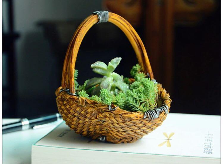 Decorative Pot/Storage Bamboo Basket (Category: Storage Boxes & Baskets) located in Cainta. Submitted by marissa_castillo (Listing ID 193385789, Image 1). Description: Intricately hand carved making it look like a real bamboo... original quality design... resin made... desktop/tabletop... artificial bamboo woven flowerpot/storage/garden decor... Condition: brand new Measurement: 13L x 10.5W x 12cmH Price: php1200.