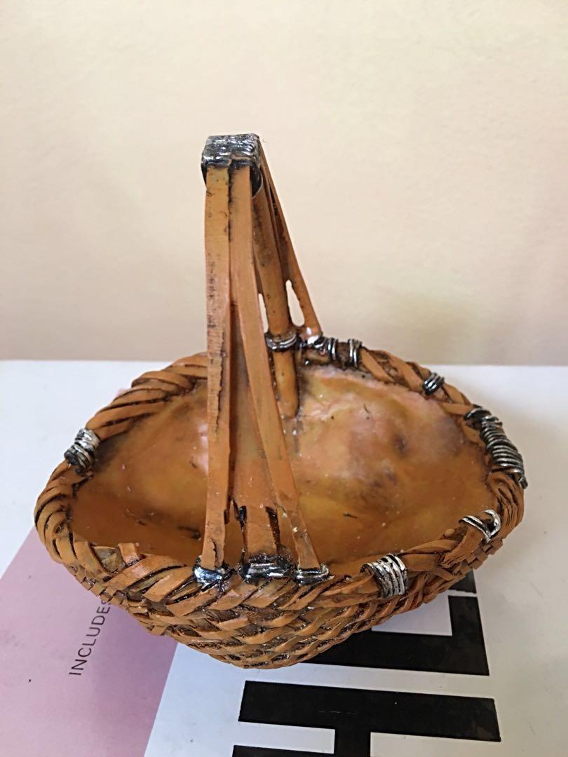 Decorative Pot/Storage Bamboo Basket (Category: Storage Boxes & Baskets) located in Cainta. Submitted by marissa_castillo (Listing ID 193385789, Image 2). Description: Intricately hand carved making it look like a real bamboo... original quality design... resin made... desktop/tabletop... artificial bamboo woven flowerpot/storage/garden decor... Condition: brand new Measurement: 13L x 10.5W x 12cmH Price: php1200.