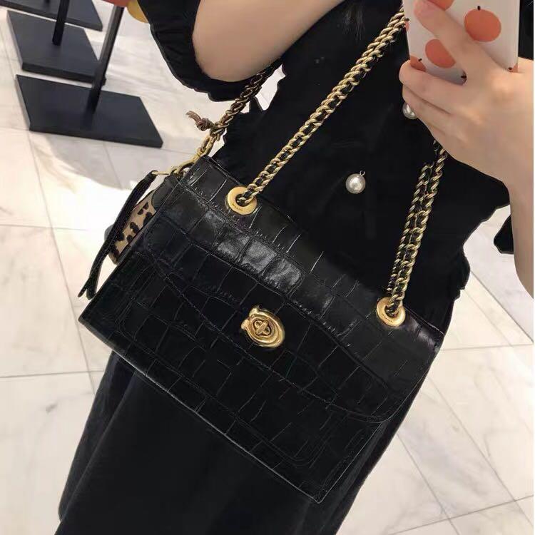 coach snakeskin satchel