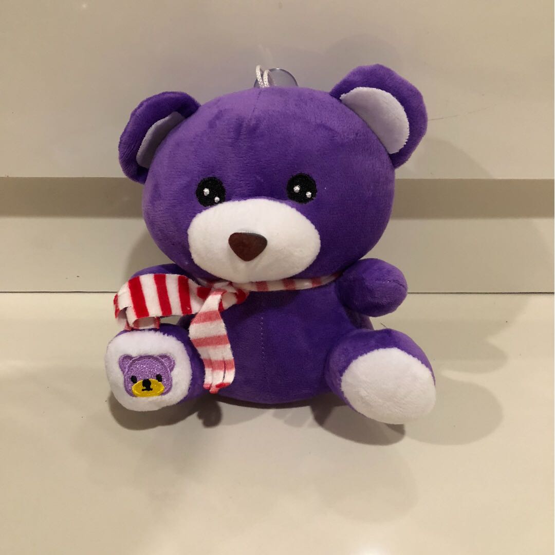 stuffed purple bear