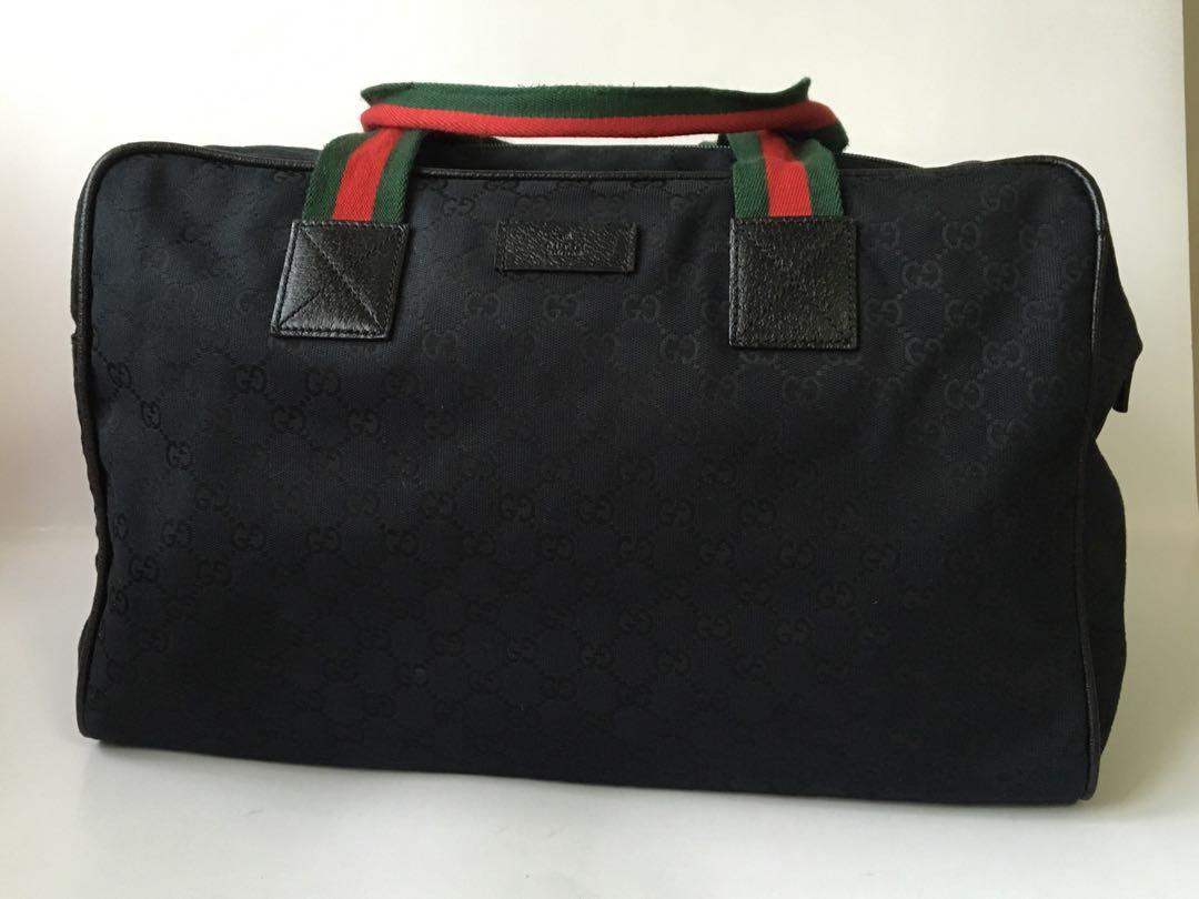 Authentic Gucci Black Monogram Canvas Duffle Bag, Luxury, Bags & Wallets on  Carousell
