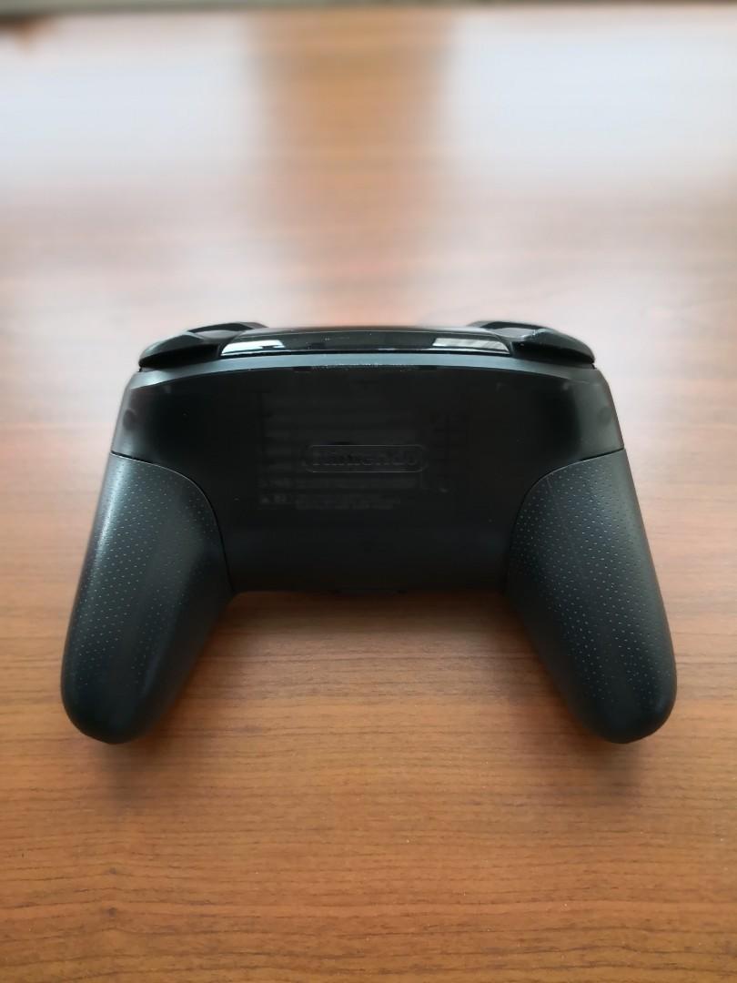 Nintendo Switch Pro Controller (Category: Nintendo) located in Singapore. Submitted by aleth (Listing ID 193736787, Image 2). Description: !PLEASE READ BEFORE OFFERING! - I'm selling a used Nintendo Switch Pro Controller - It was purchased in Japan in October 2017 - The controller has 1 defect - the left joystick has issues moving all the way forward constantly. i.e. sometimes it will register 80% forward motion instead of 100%, and this is very 