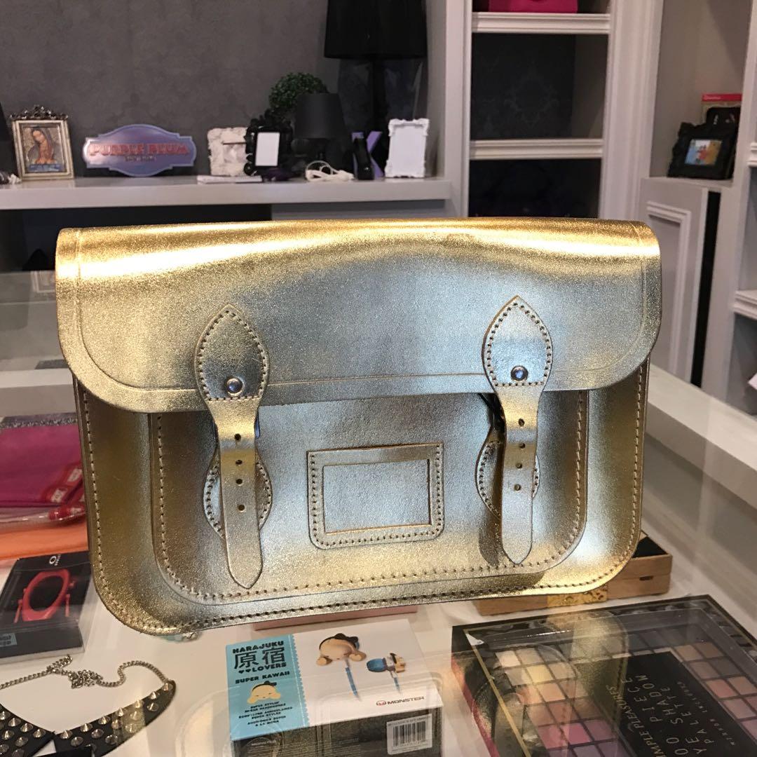 Cambridge Satchel (Category: Cross-body Bags) located in Paranaque City. Submitted by purpleplumstylestudio (Listing ID 193896908, Image 1). Description: Kept unused but has fading (gold paint has peeled a bit) on the front flap.