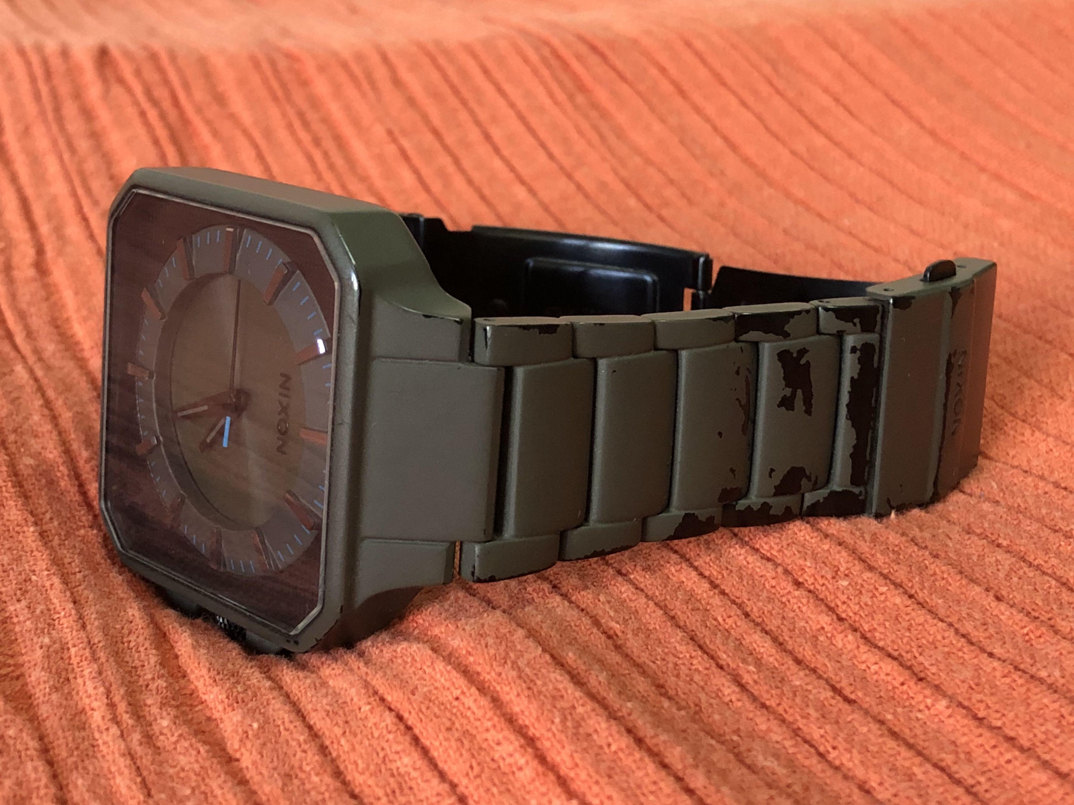 Nixon The Platform 'Drab' (Category: Men's Watches) located in Singapore. Submitted by m3nta (Listing ID 108775286, Image 3). Description: Please Note: The fade on the wristband is the result of Nixon's special paint "Chromacoat" that comes off randomly with time to look like a well-worn watch. It is NOT the result of negligence and damage. Google "Nixon Chromacoat" if the link below doesn't work. Chromacoat info: http://online.nixon.com/us/en/ha