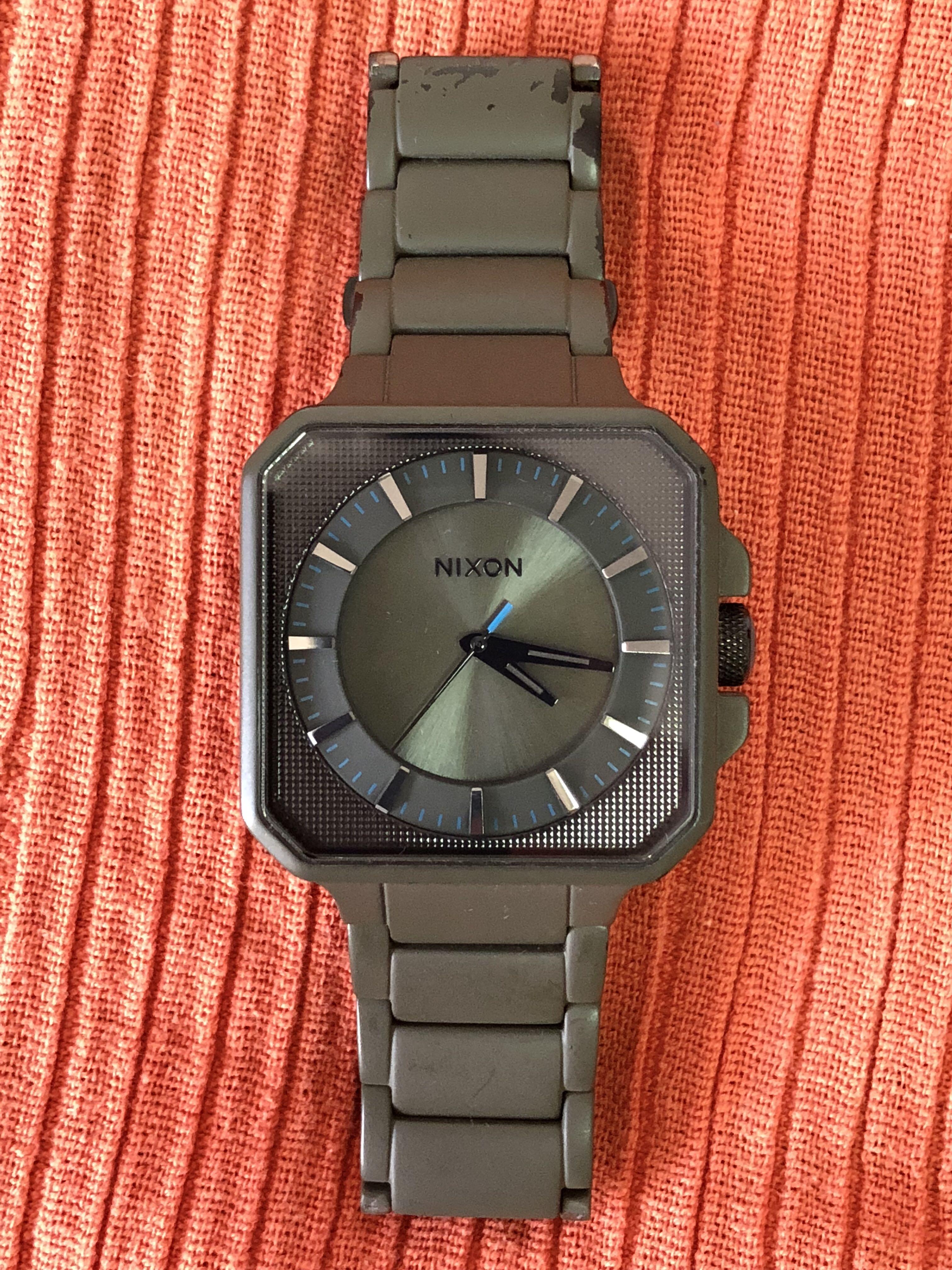 Nixon The Platform 'Drab' (Category: Men's Watches) located in Singapore. Submitted by m3nta (Listing ID 108775286, Image 1). Description: Please Note: The fade on the wristband is the result of Nixon's special paint "Chromacoat" that comes off randomly with time to look like a well-worn watch. It is NOT the result of negligence and damage. Google "Nixon Chromacoat" if the link below doesn't work. Chromacoat info: http://online.nixon.com/us/en/ha