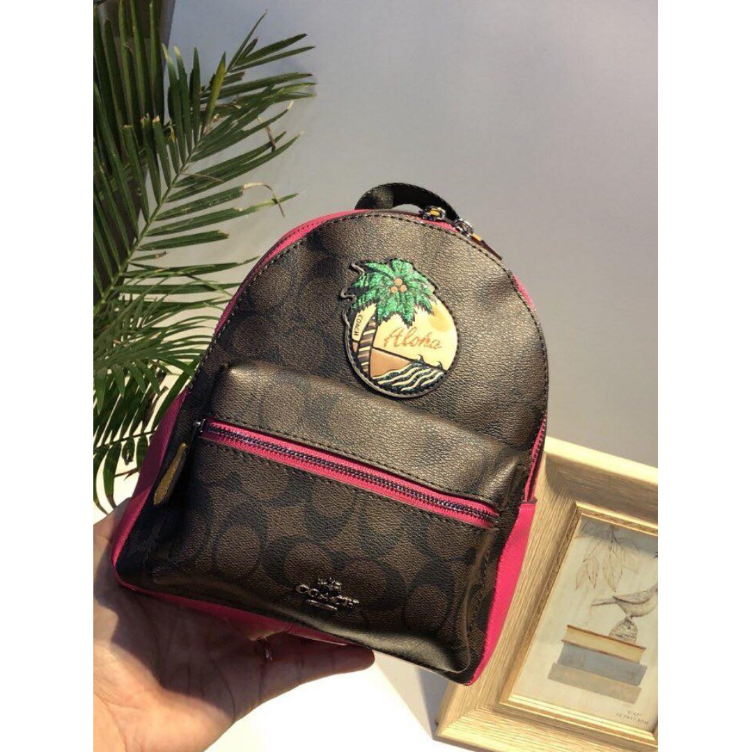 mini charlie backpack in signature canvas