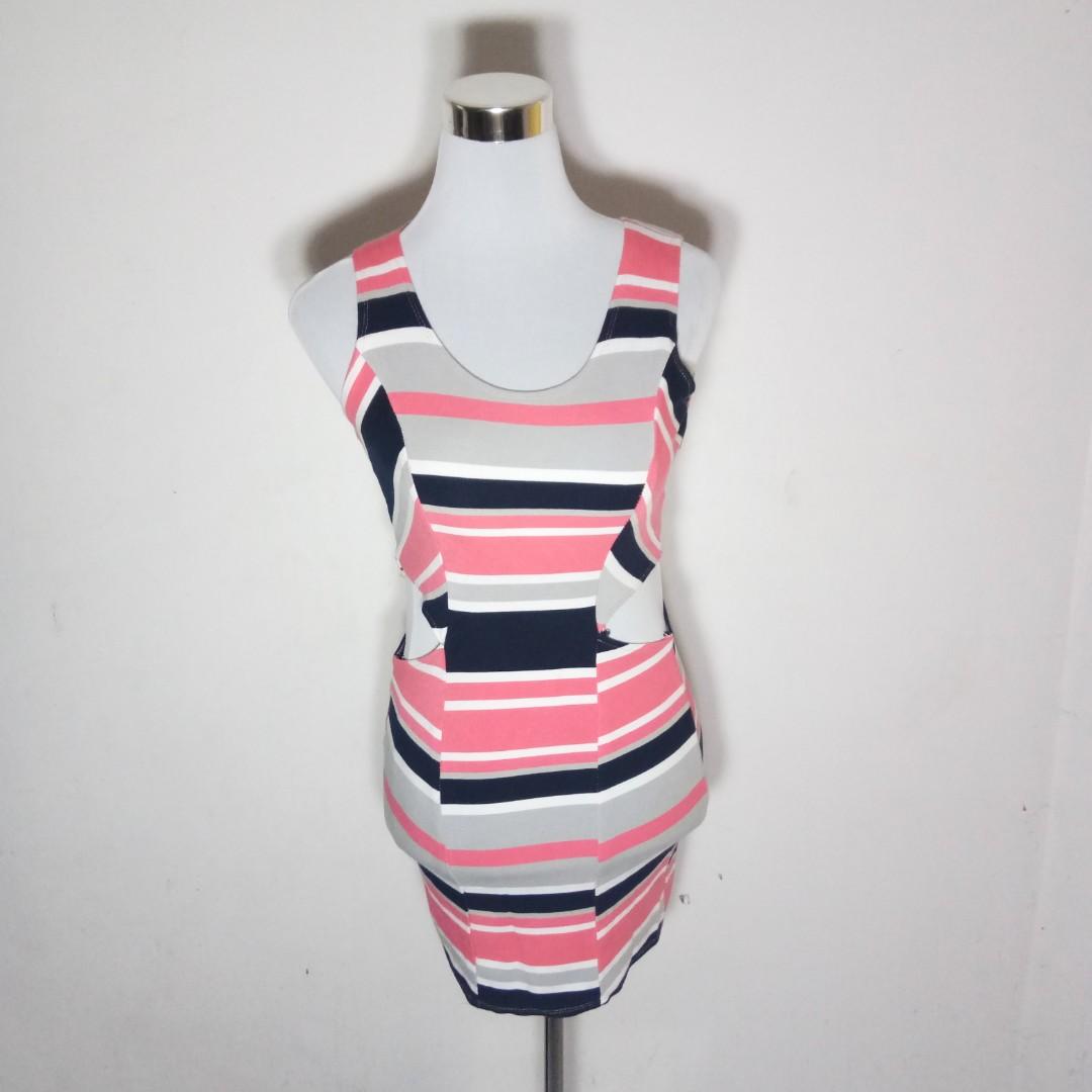 Striped bodycon dress (Category: Dresses) located in Quezon City. Submitted by rainbowpride (Listing ID 194335081, Image 1). Description: Used in great condition. Gives a chic look while staying comfortable. The material is stretchy and hugs in all the right places. 😊.