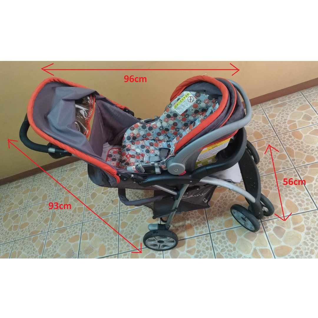 orange car seat and stroller combo