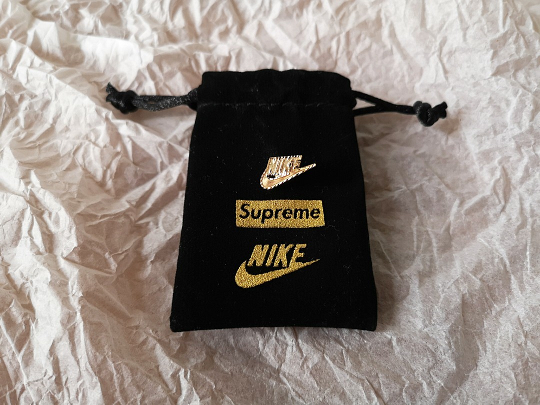 supreme nike gold earring