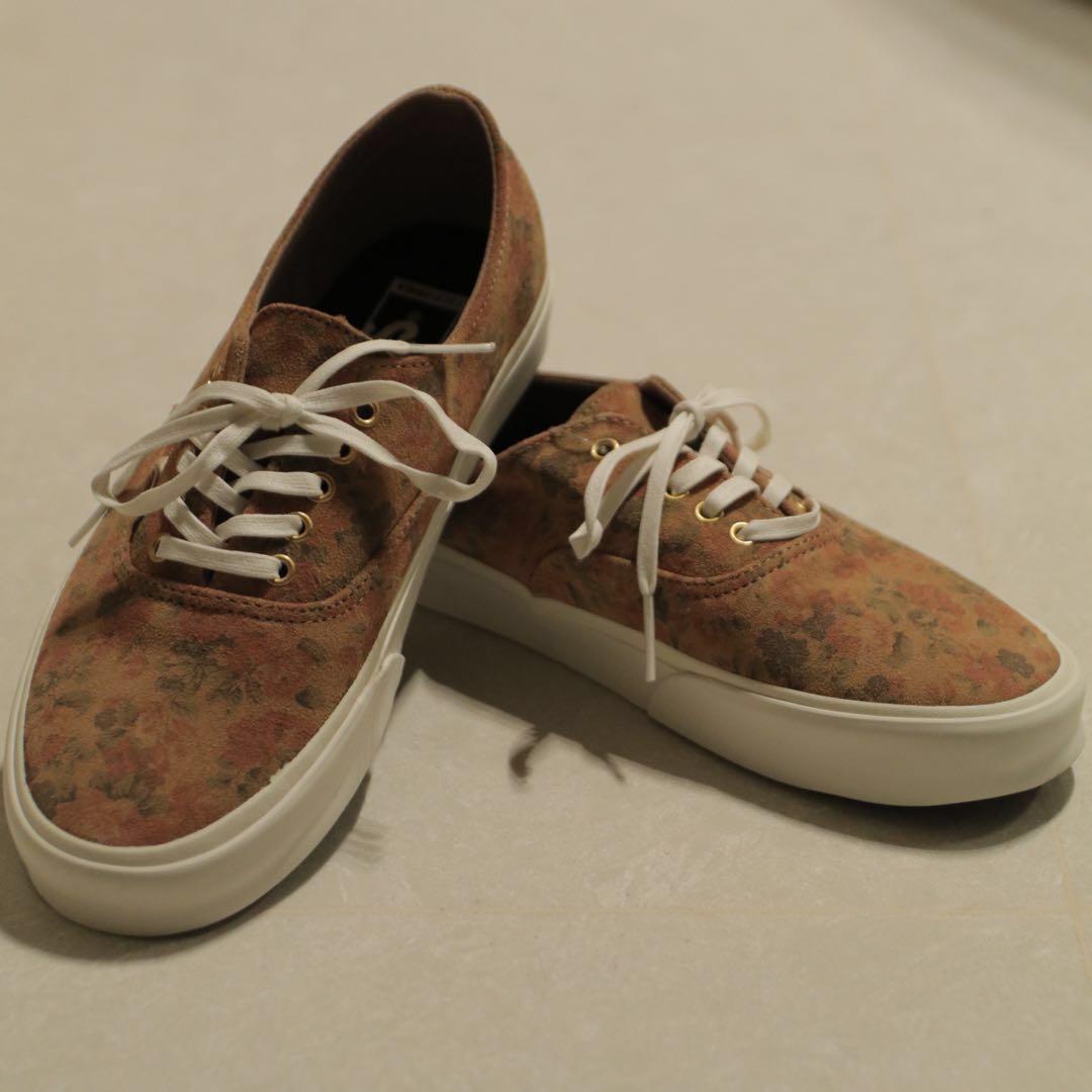 tan vans with flowers