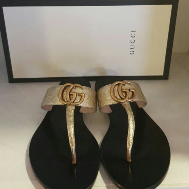 sandal merk gucci