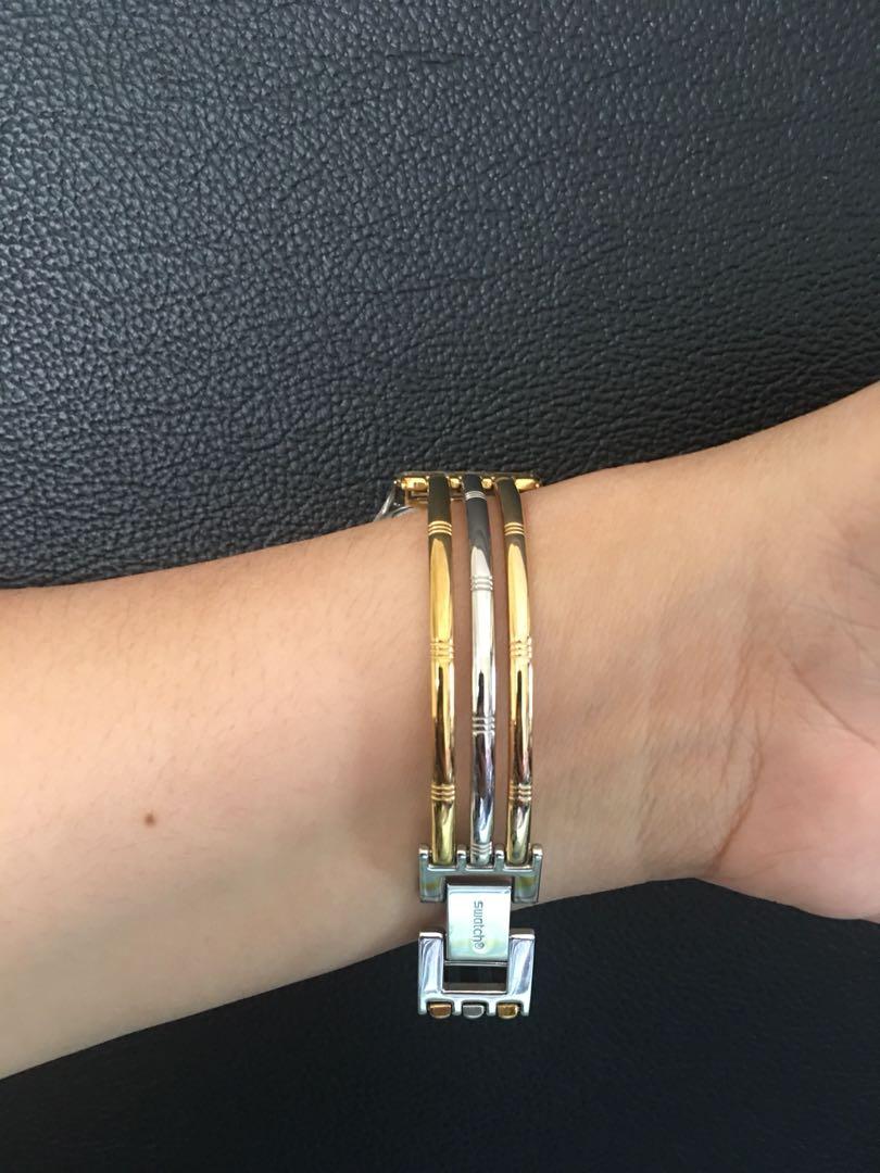 Swatch tri hotsell gold