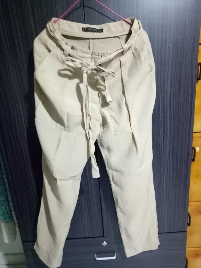 beige trousers zara