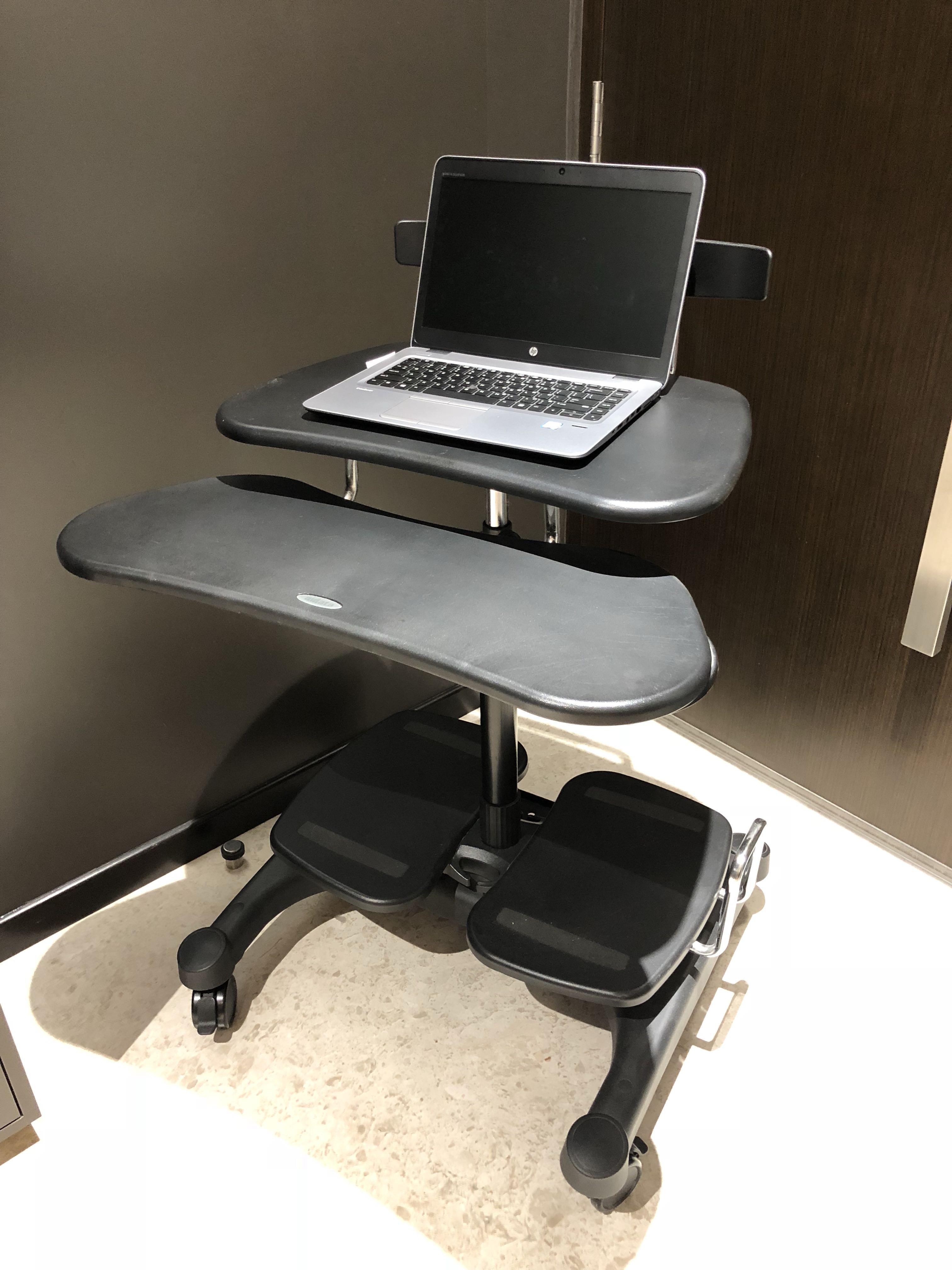 Movable top desktop table