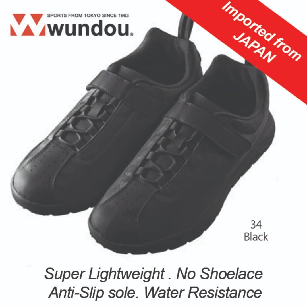 branded black sports shoes