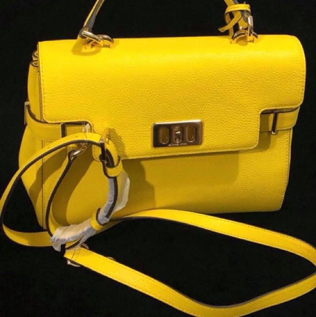 mk yellow sling bag