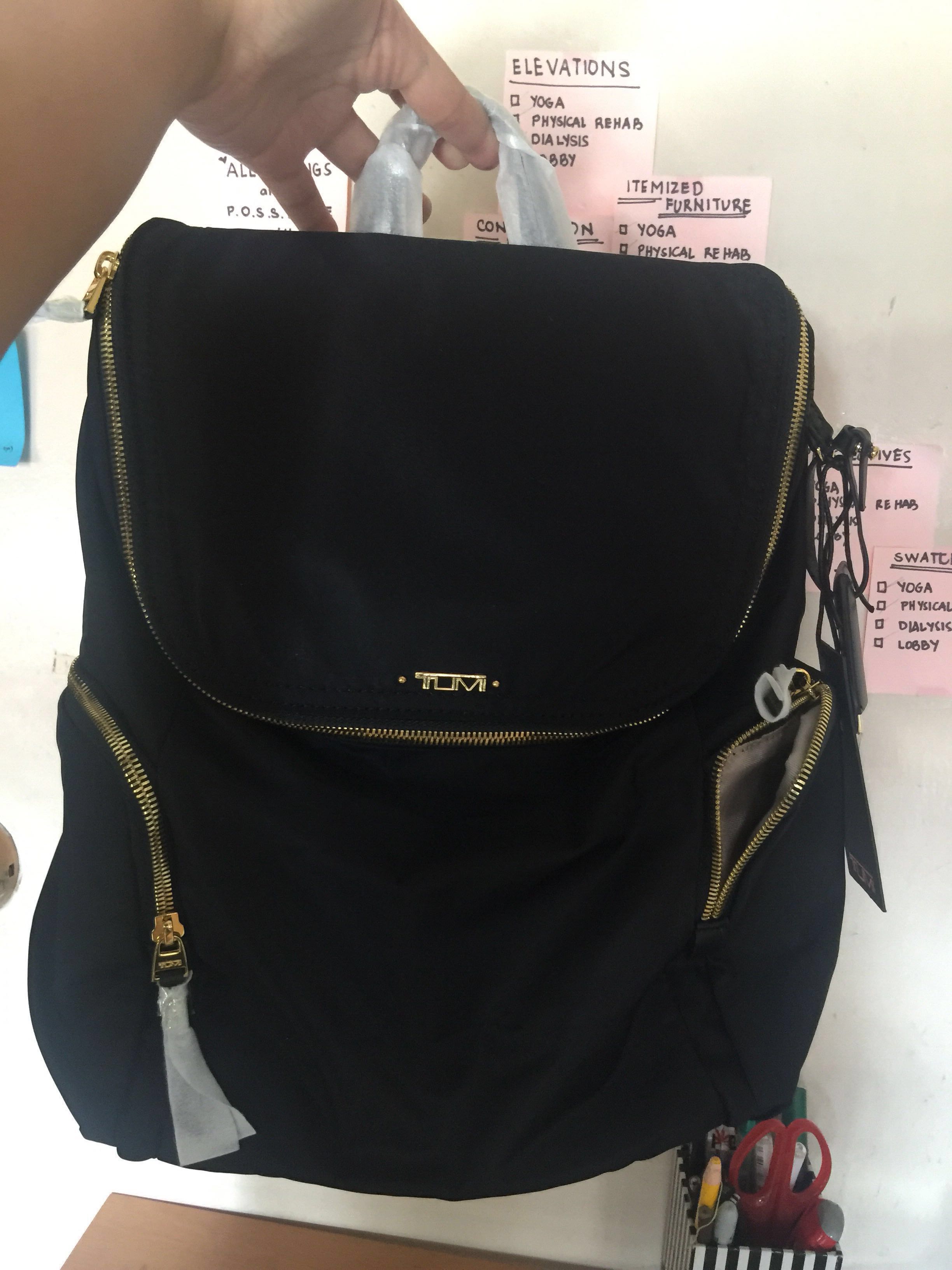 tumi lexa zip flap backpack