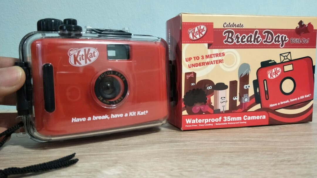 Kitkat waterproof camera film, Photography, Cameras on Carousell