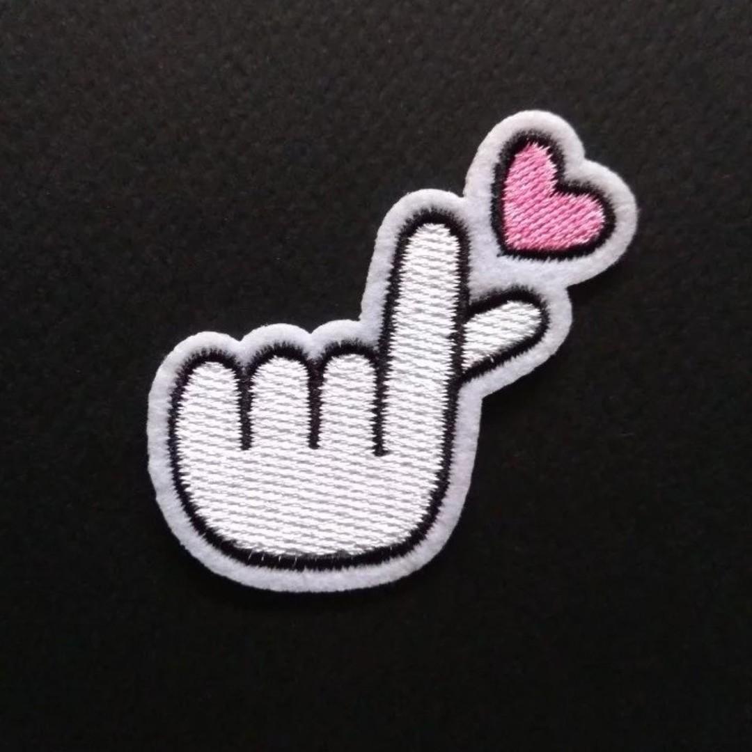 https://media.karousell.com/media/photos/products/2018/10/23/kpop_heart_love_hand_sign_iron_on_patch_1540275103_bd082f1e0_progressive