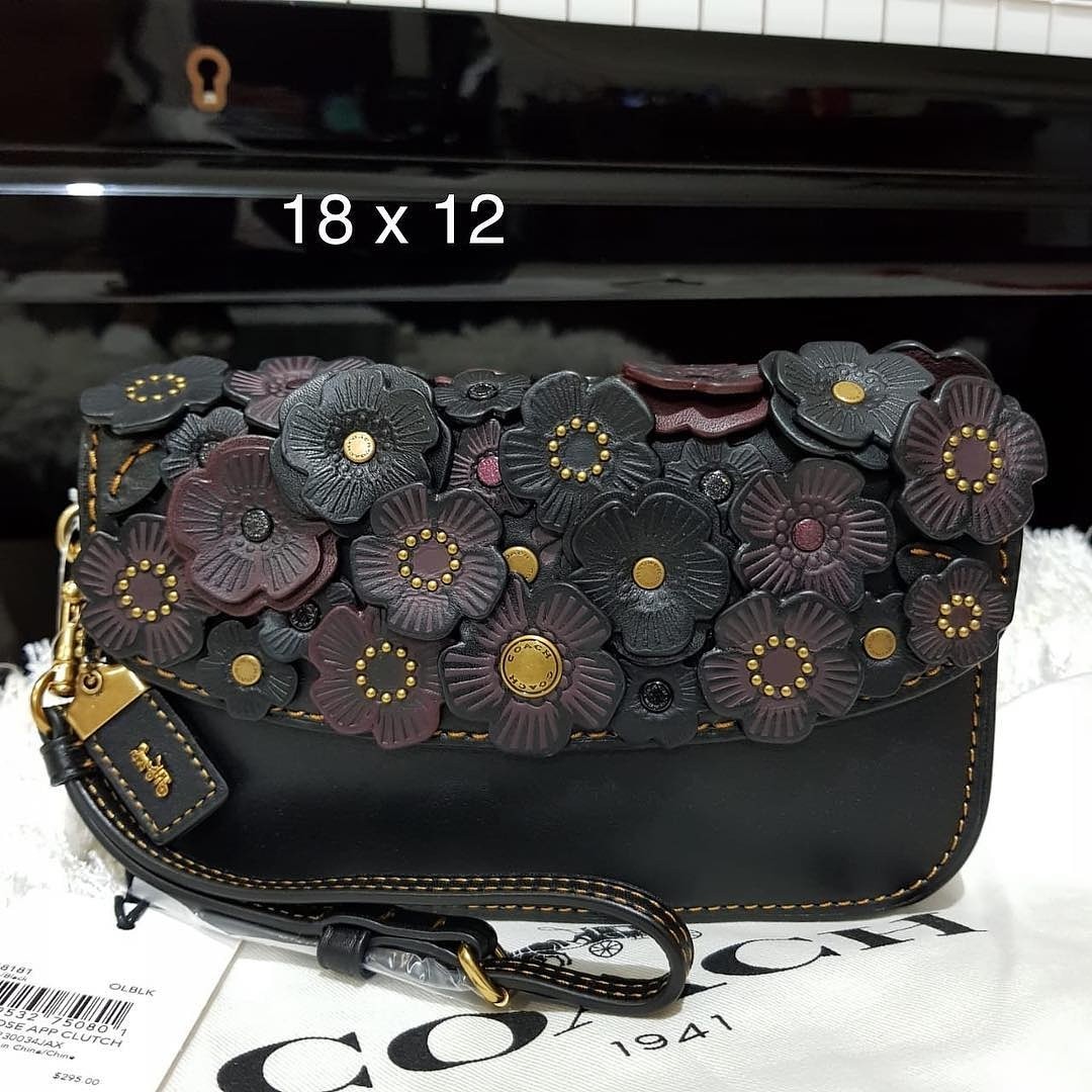 Coach tea rose clutch top