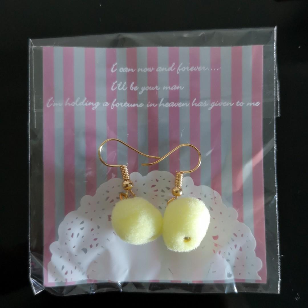 Fur ball hotsell earrings