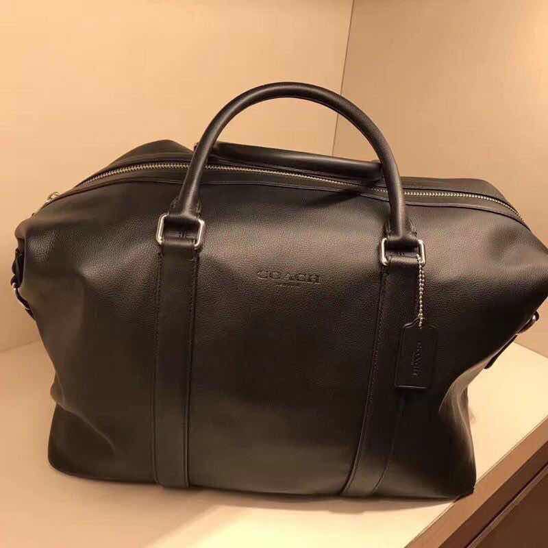 voyager bag coach