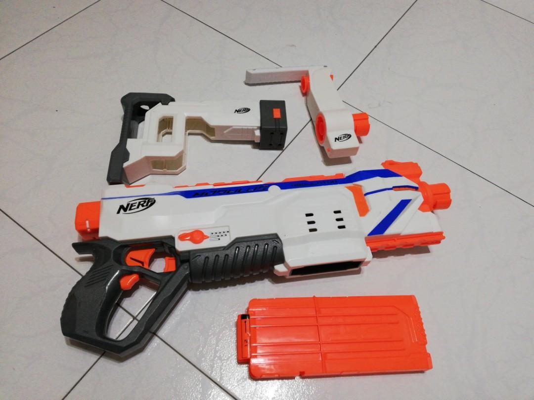 Nerf modulus regulator (Category: Action & Battle Toys) located in Singapore. Submitted by heiantrader (Listing ID 196513270, Image 2). Description: Nerf modulus regulator. Planning to sell/trade for other gunz. It includes the gun itself, stock, handle and a 12 dart mag (not full set) Abit weak batts included for testing and probably playing for a while. Offer me ur price/gun that you are trading with! Thx! ;).
